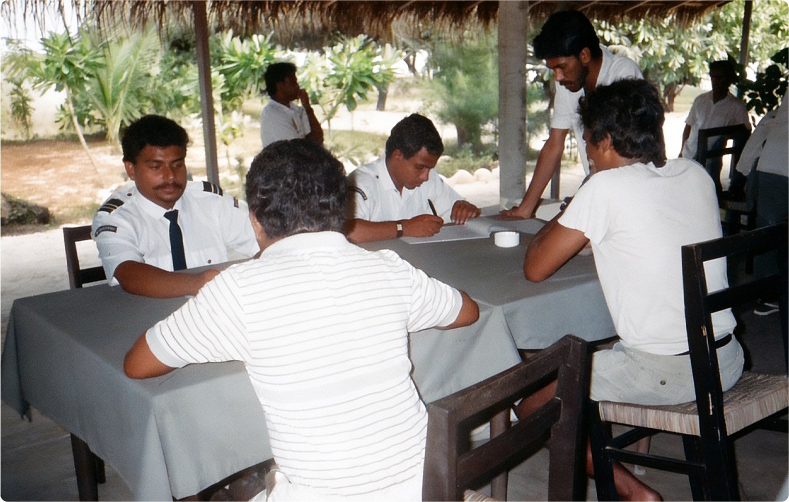 Officers issuing visas on-site at Furanafushi, 1989
